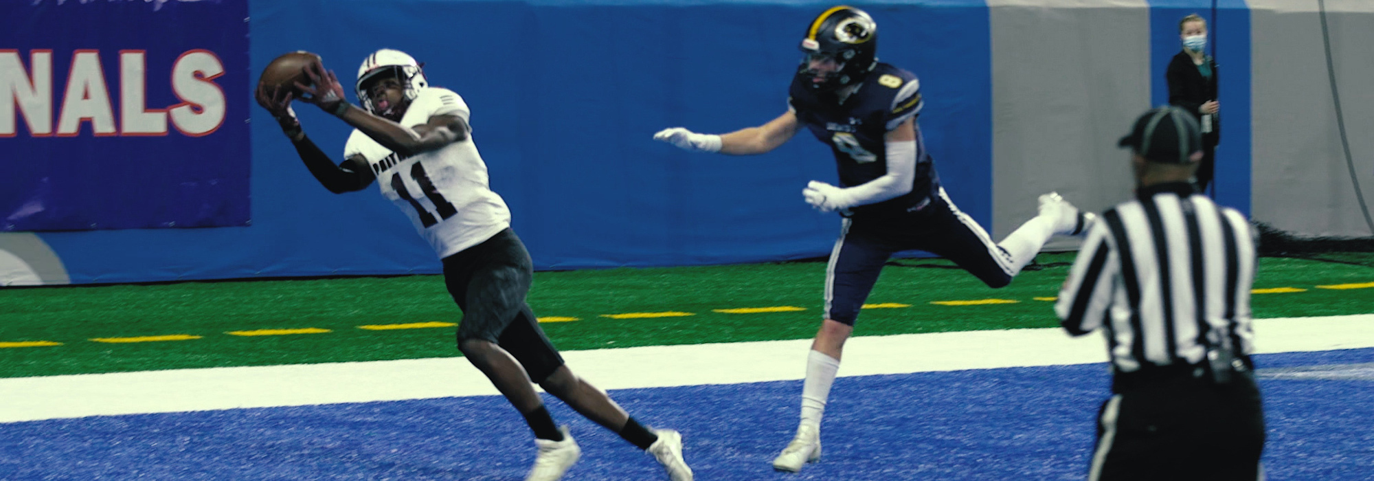 Receiver making a catch at Ford Field